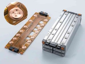 High-precision multi-layer CCS FPC designed for next-generation EV battery pack cells contact systems | JS Circuit INC Automotive CCS FPC integration on a multi-cell EV battery module showing laser weld pads